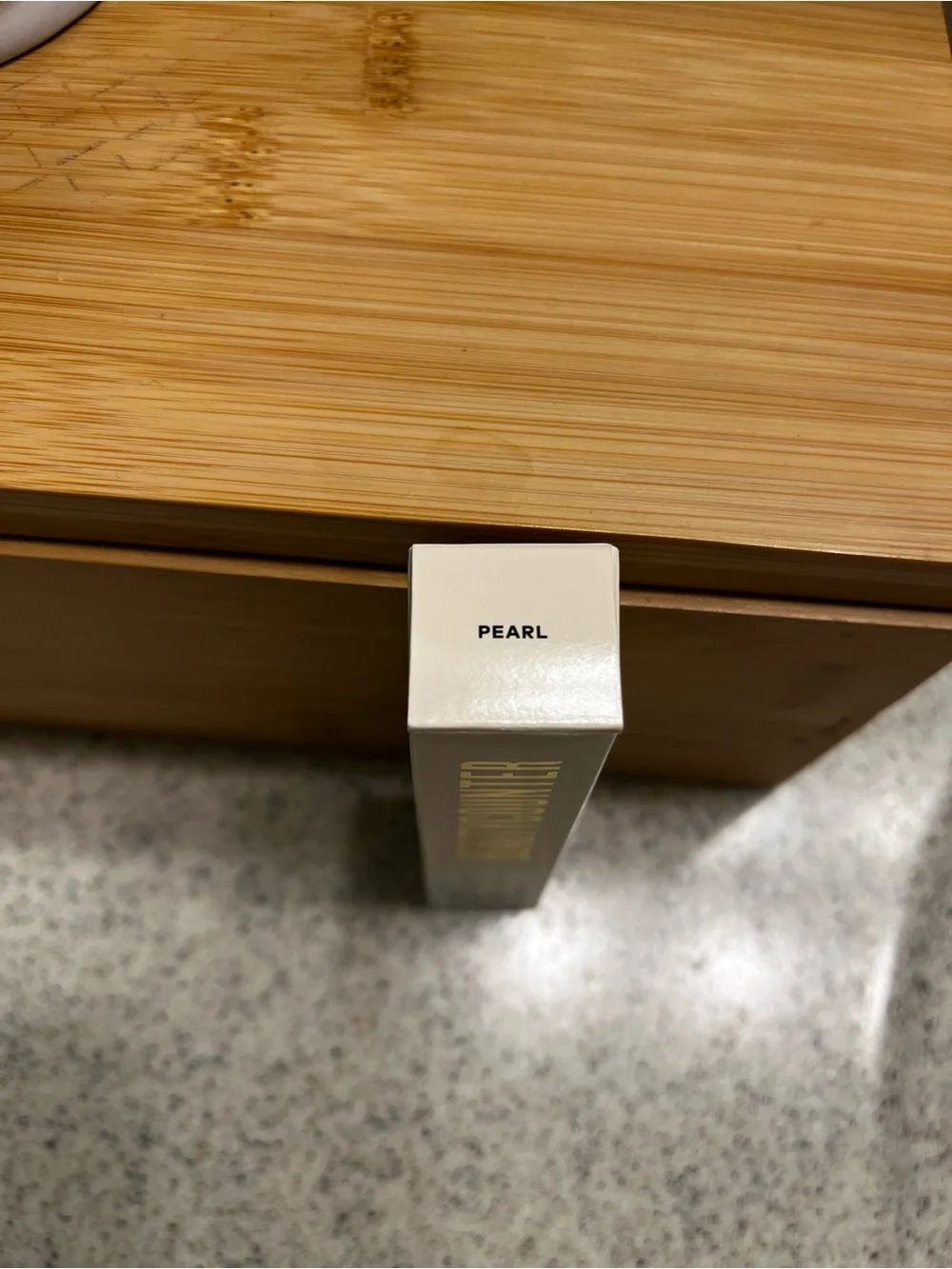 Pearl colored sheer conditioning lipstick
